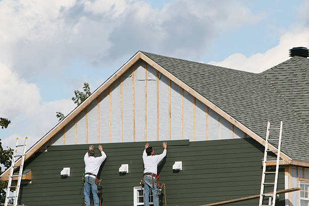 Professional Siding technician working in Abington, PA